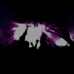 Silhouettes against an electric pulse: a crowd bathed in vibrant concert lights, losing themselves to the rhythm of the night.