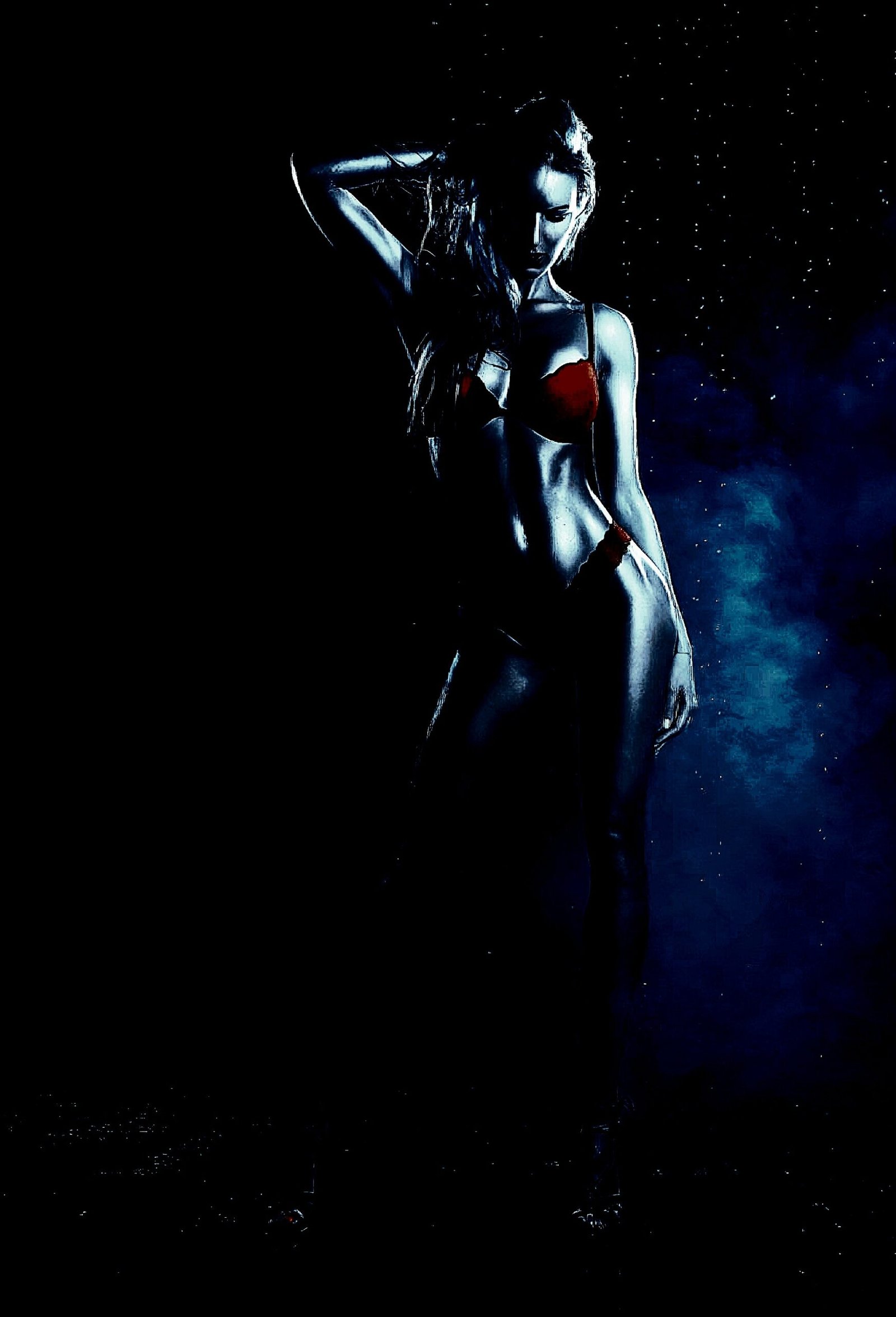 Silhouette of a woman in a bikini with hand in hair, set against a smoky, dark blue backdrop for a mysterious vibe.
