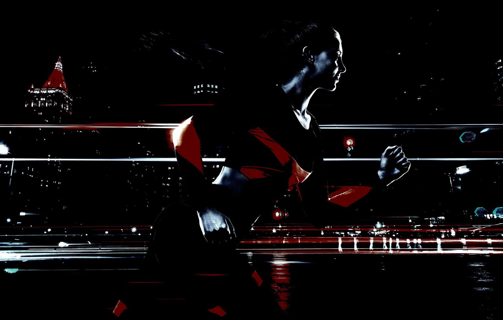 Dynamic image of a woman running at night through a cityscape, her figure illuminated by street lights, evoking power and movement.