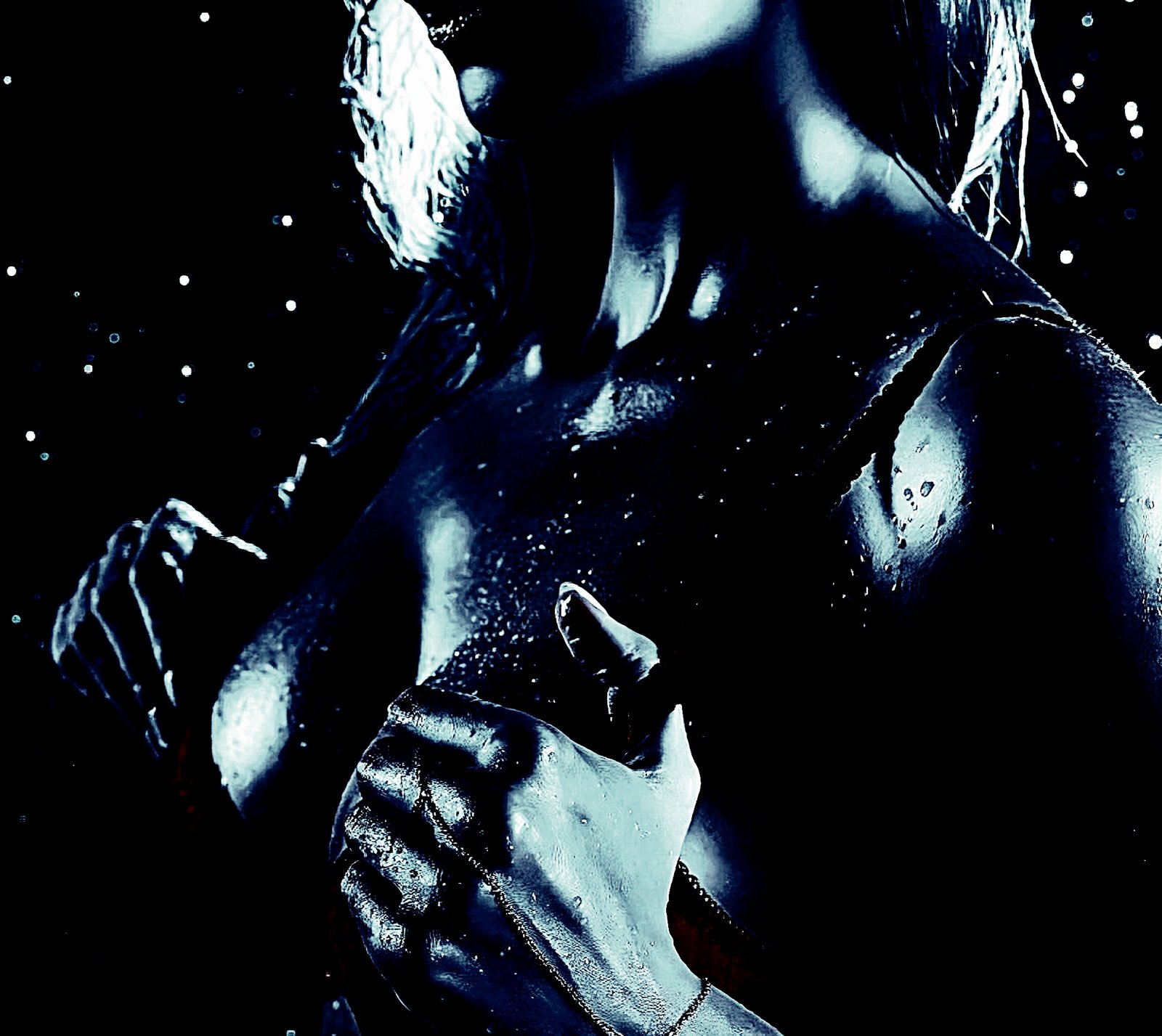 Wet skin glistening in a dark, moody setting suggestive of a gothic or noir aesthetic.