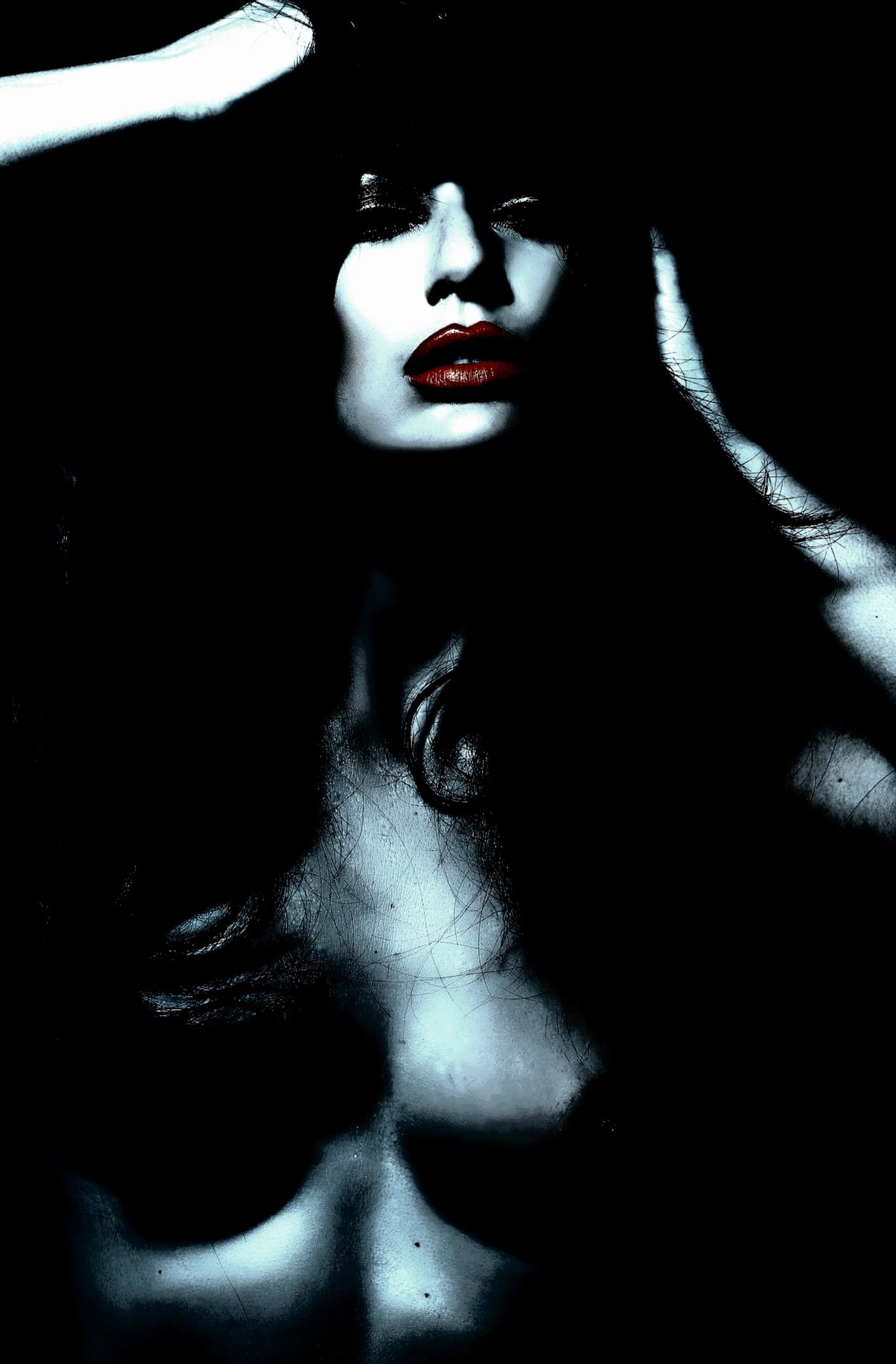 Edgy woman in red lipstick challenging 'red flags in a woman' stereotypes.