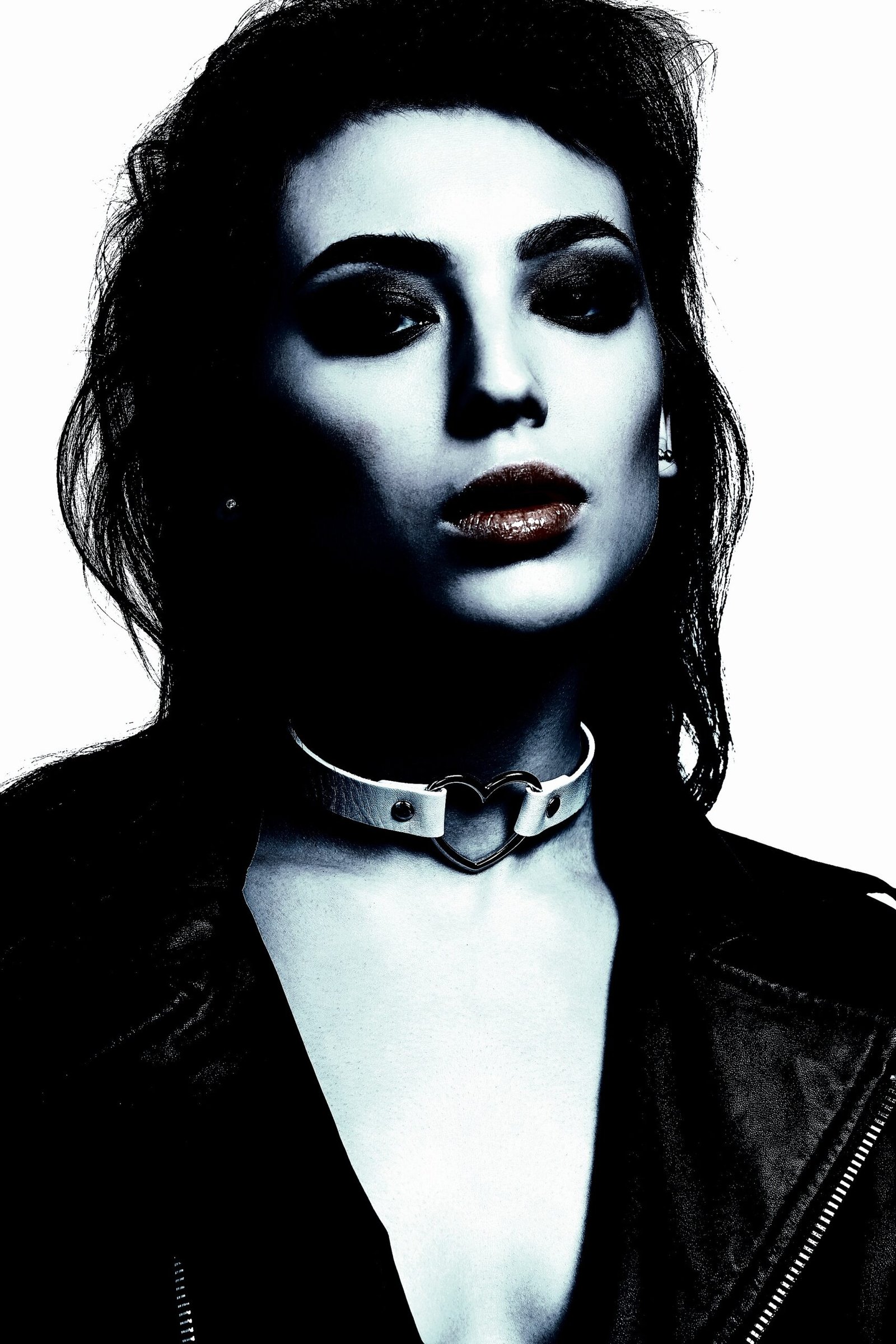 Gothic jewelry showcasing a detailed silver bracelet on a woman's arm.
