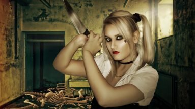 Woman with blonde hair and a knife, standing in a room with skeletons, showcasing the controlled danger of knife play.