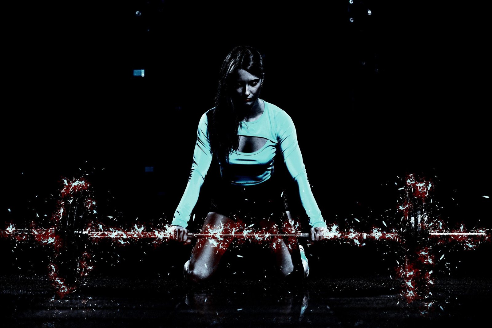 Woman kneeling with a barbell emitting sparks, symbolizing intense power and raw energy.