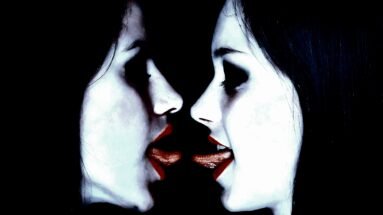 Close-up of two individuals, their faces close, expressing deep intimacy and connection.