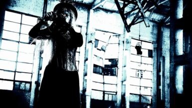 Steampunk-inspired woman in a corset, standing in an abandoned industrial building with dramatic lighting.