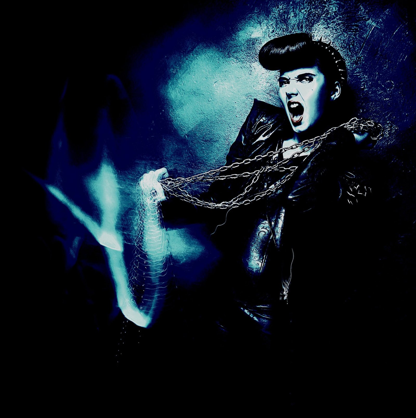 Fierce woman in leather wielding heavy chains, with bold expressions and dramatic lighting.