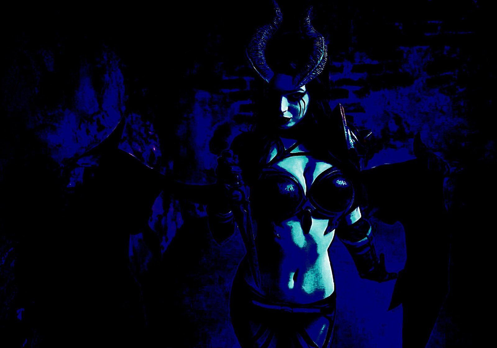 Woman kneeling in a pentagram circle surrounded by candles, performing a dark ritual in a foggy room.